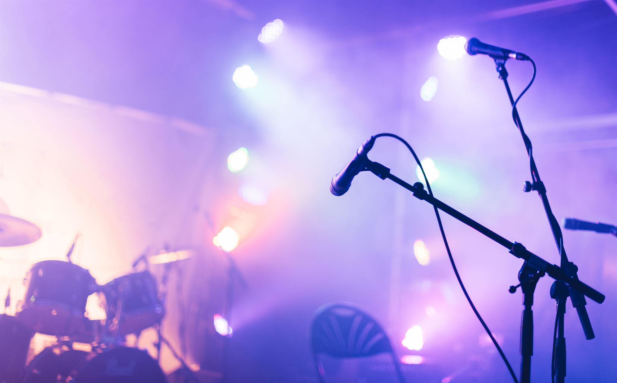 Band members performing on stage