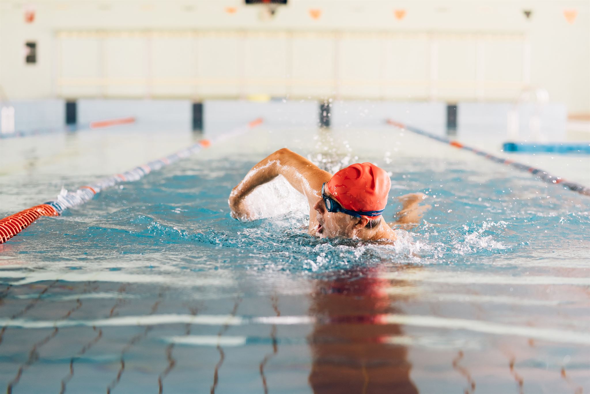 Swimmers practicing butterfly stroke
