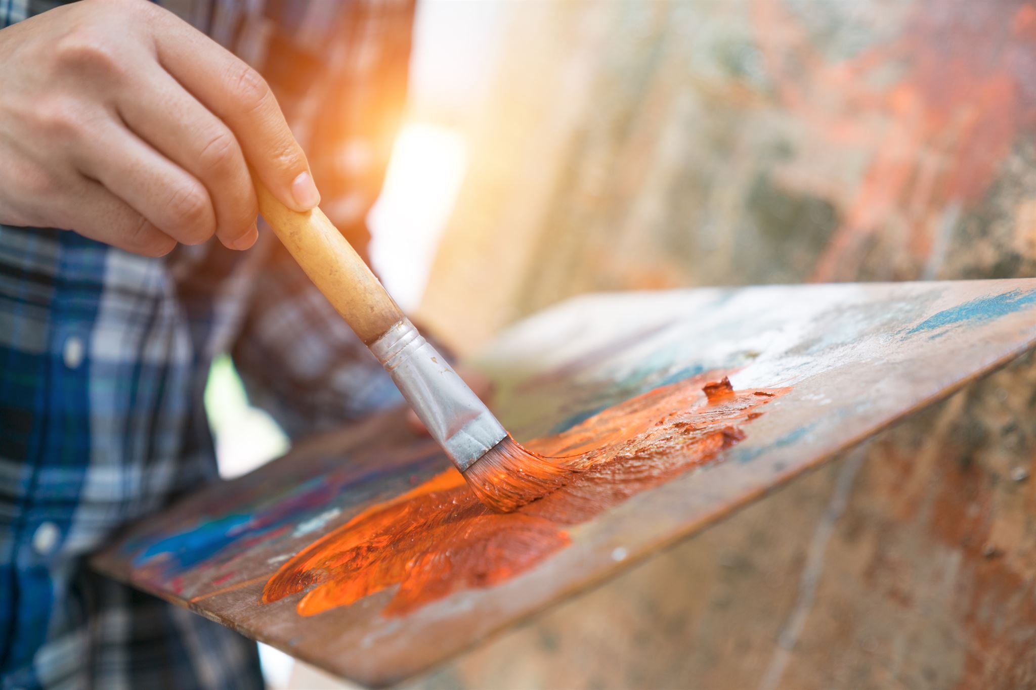 Visual artist painting colorful abstract art
