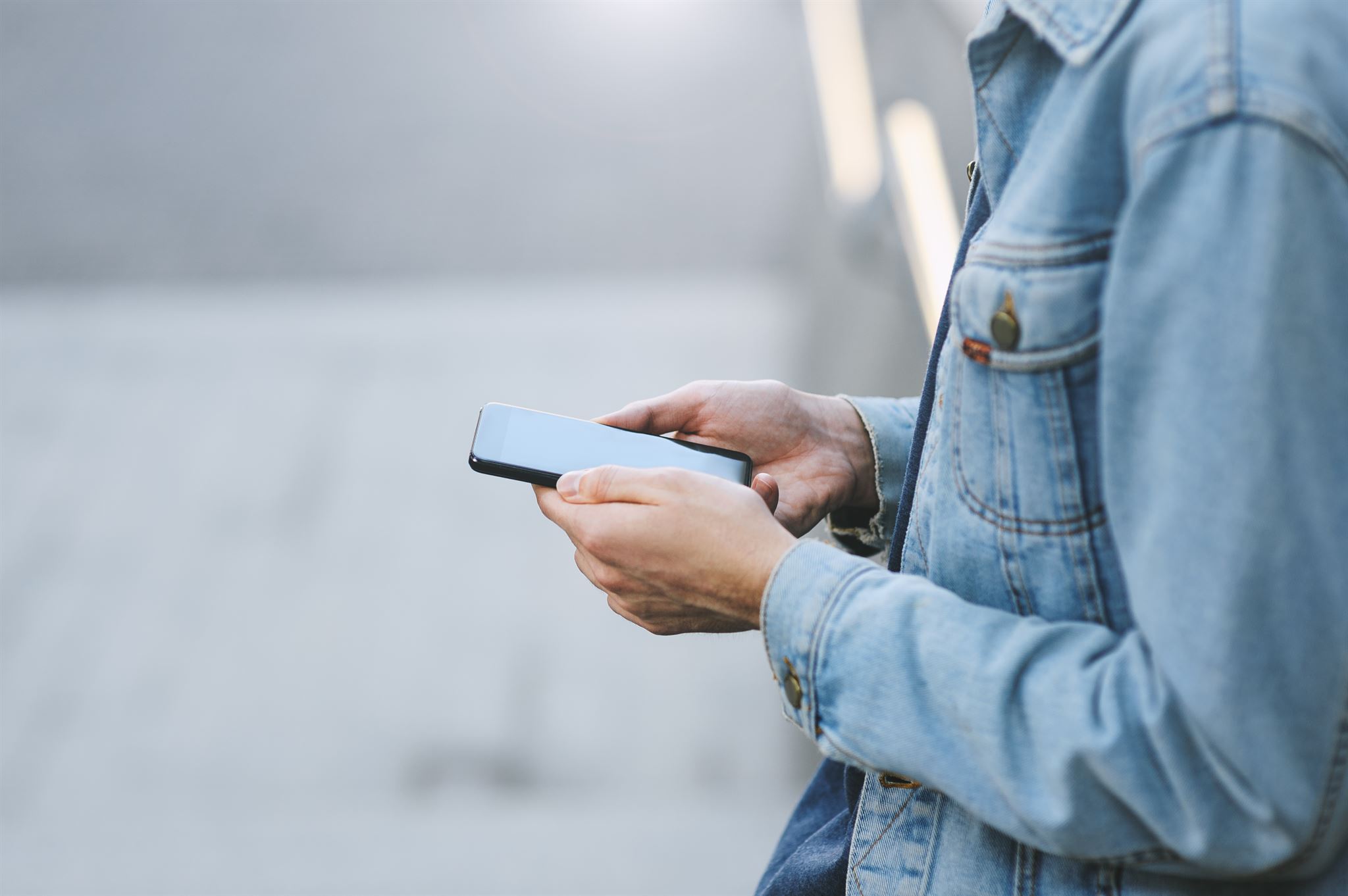 Attendee checking in with mobile device