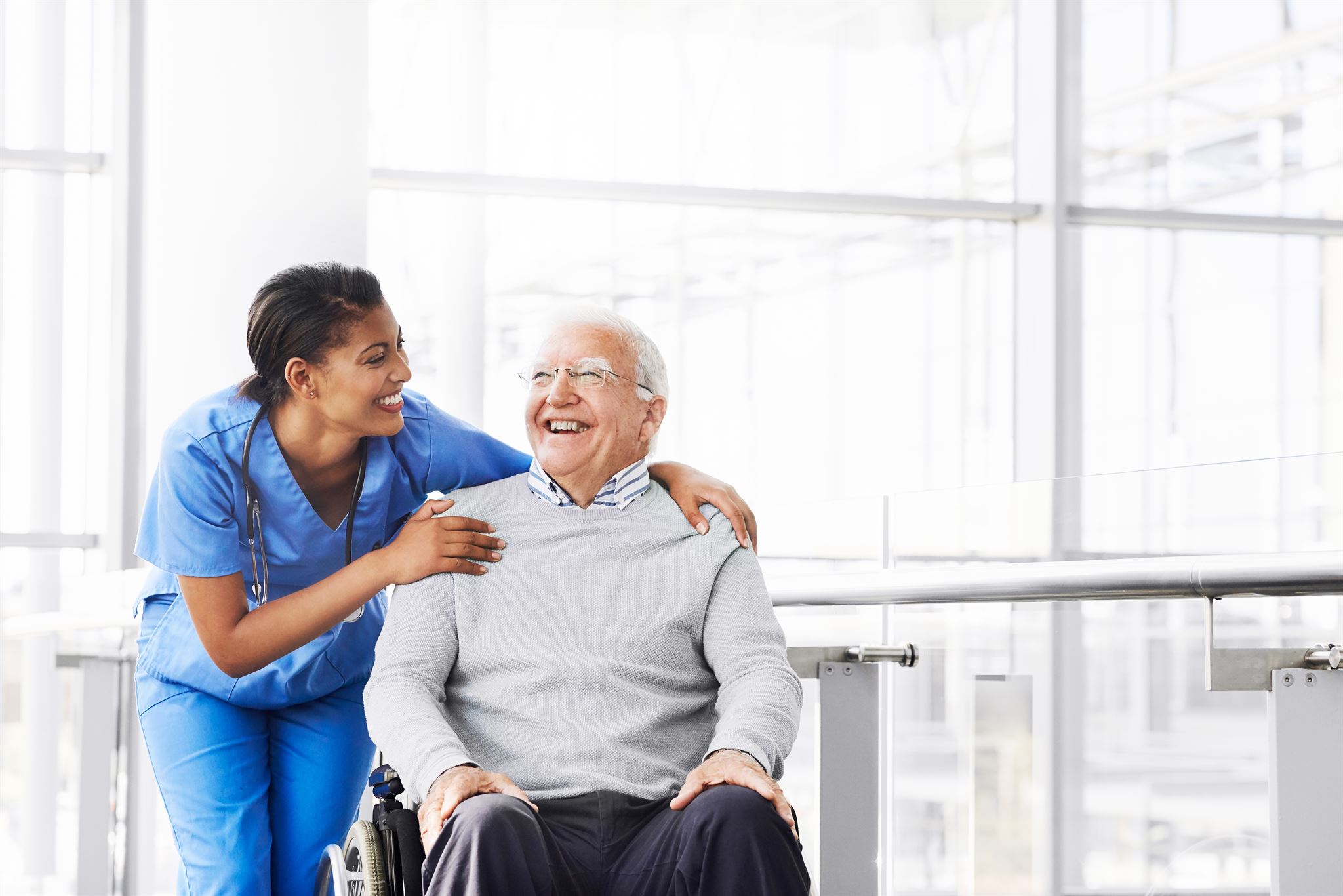Healthcare professional assisting patient