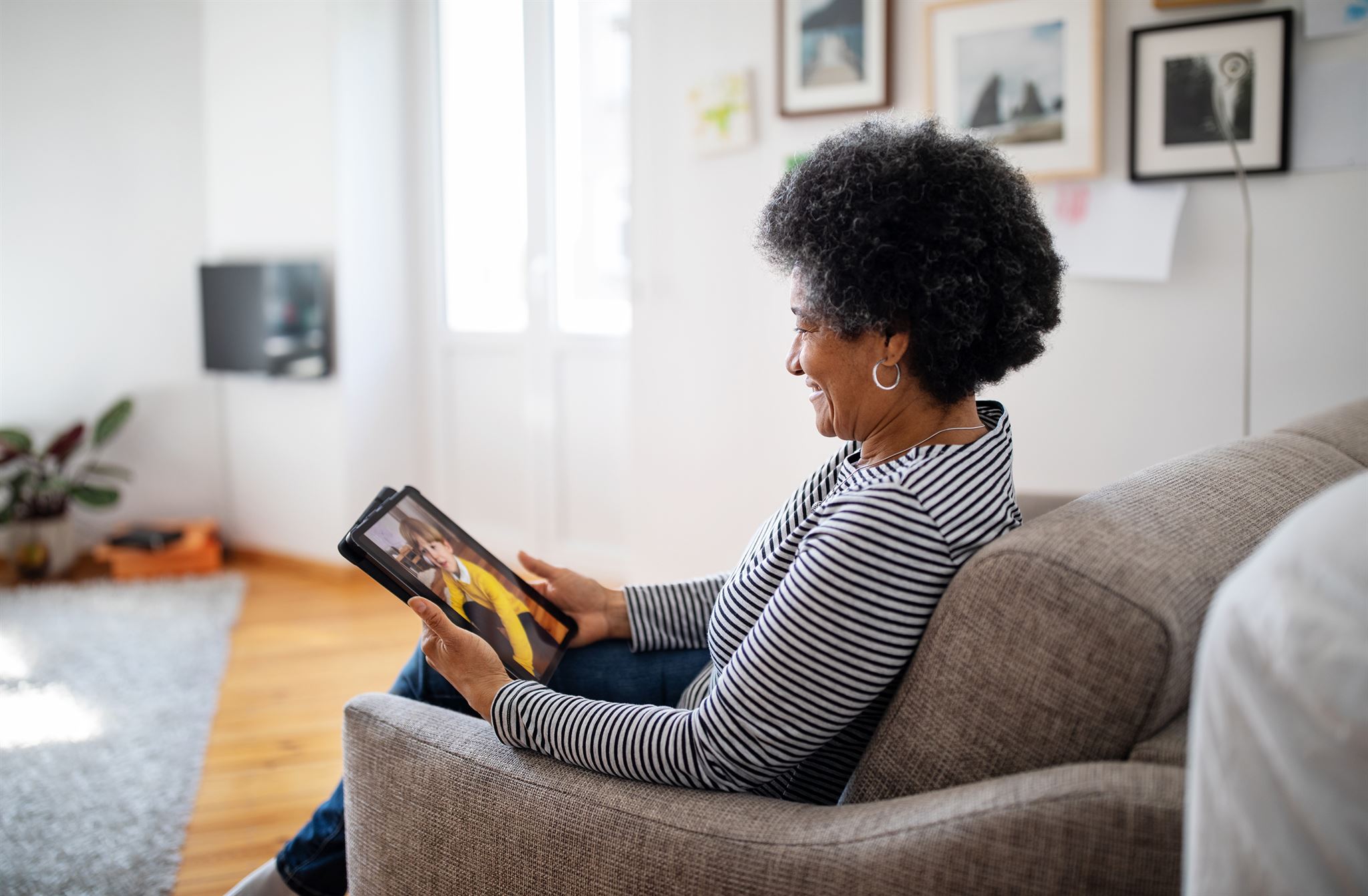 Resident using tablet at home