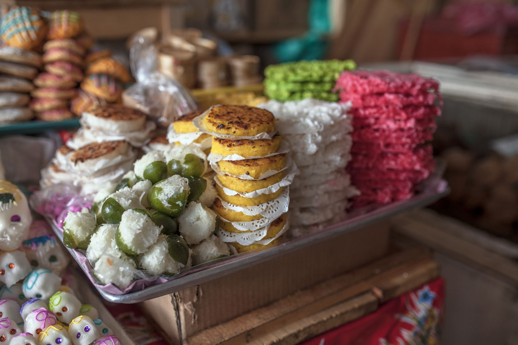 Market vendor booth with colorful products