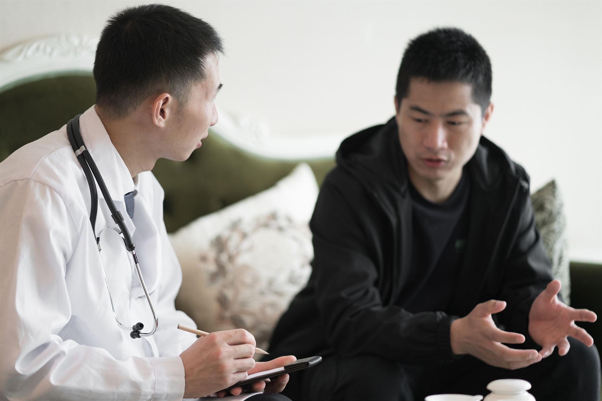 Nurse reviewing contract on tablet