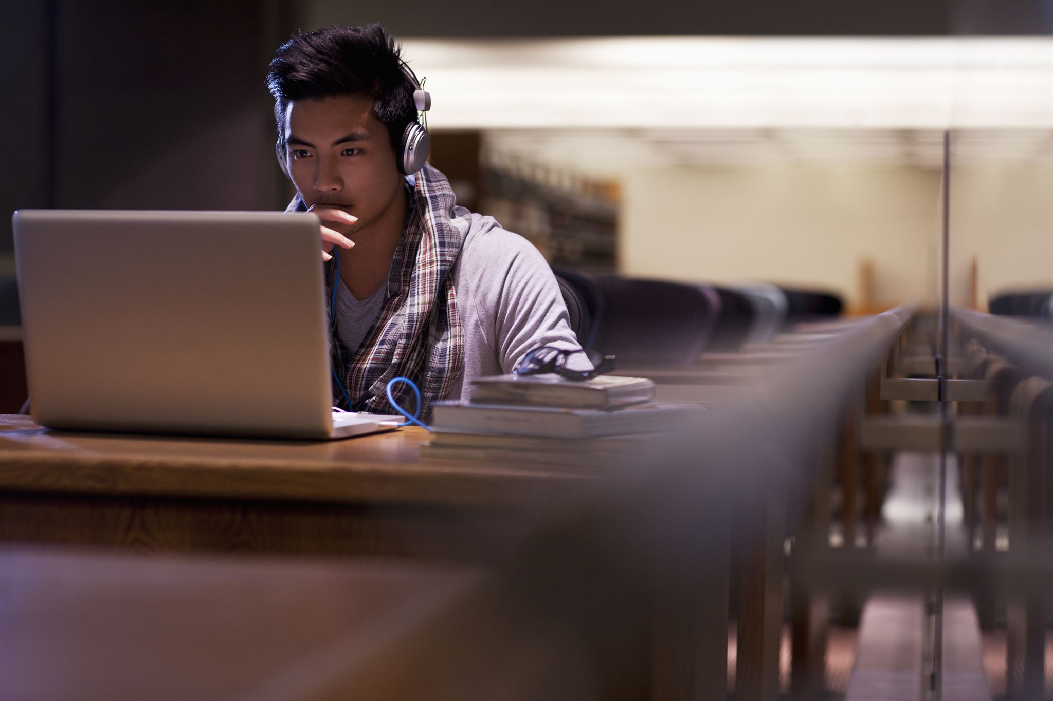 Student viewing alerts on laptop