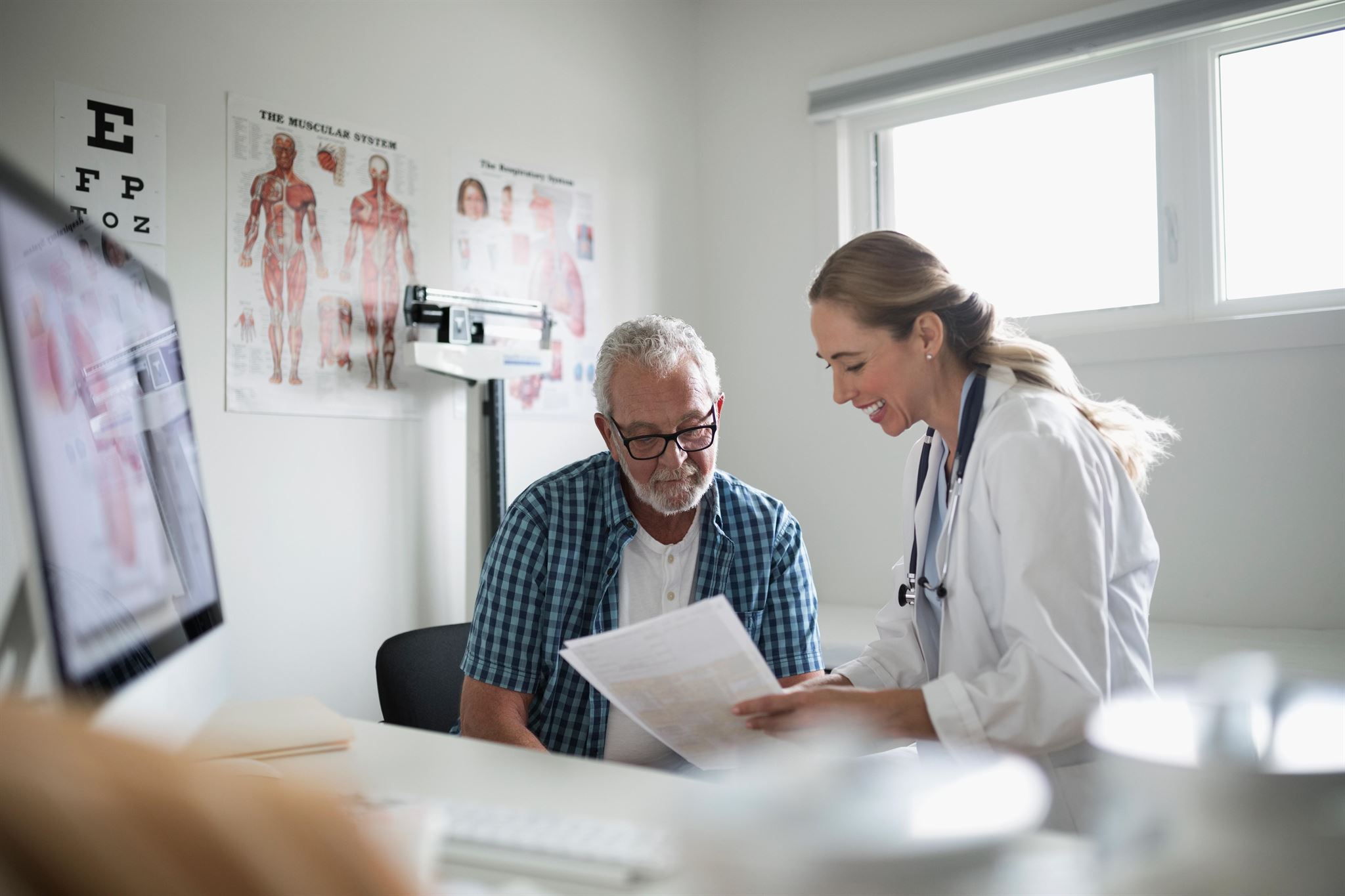 Clinician reviewing patient symptom dashboard