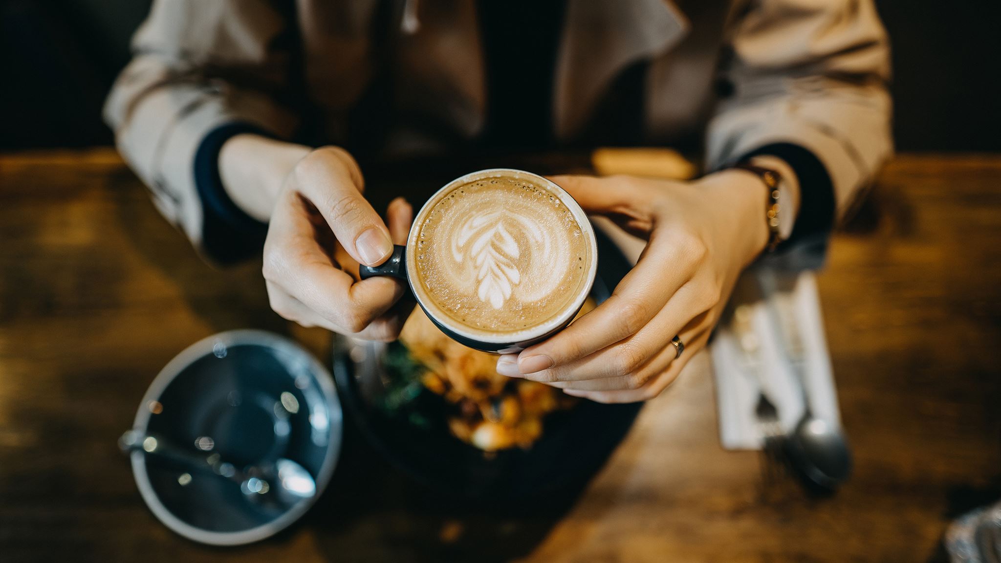 Coffee tasting event with people enjoying coffee