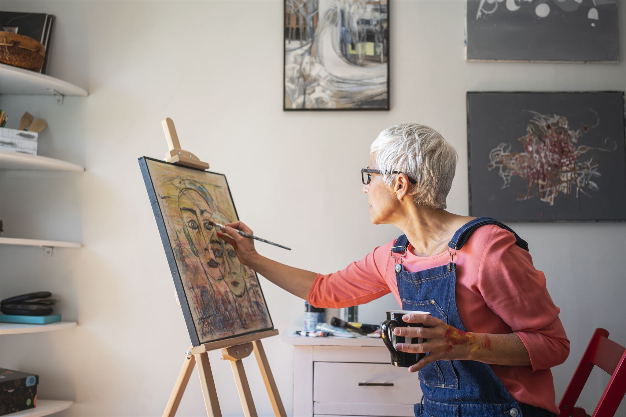 Artist painting on canvas
