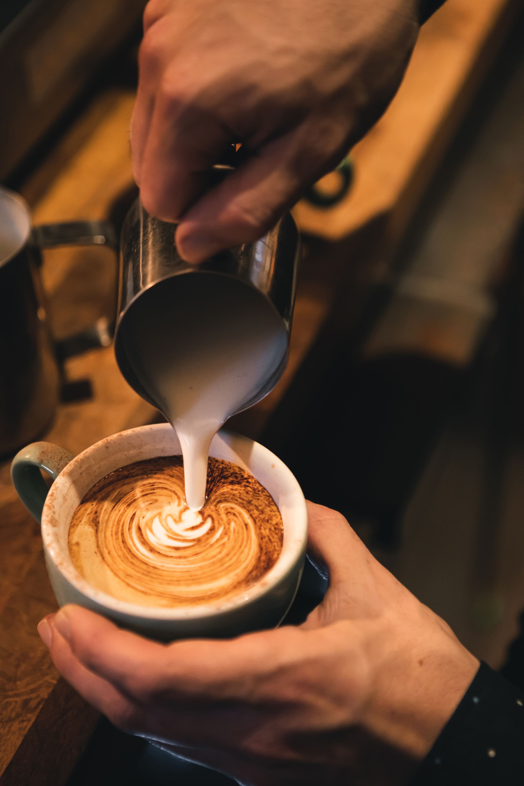 Barista preparing latte art