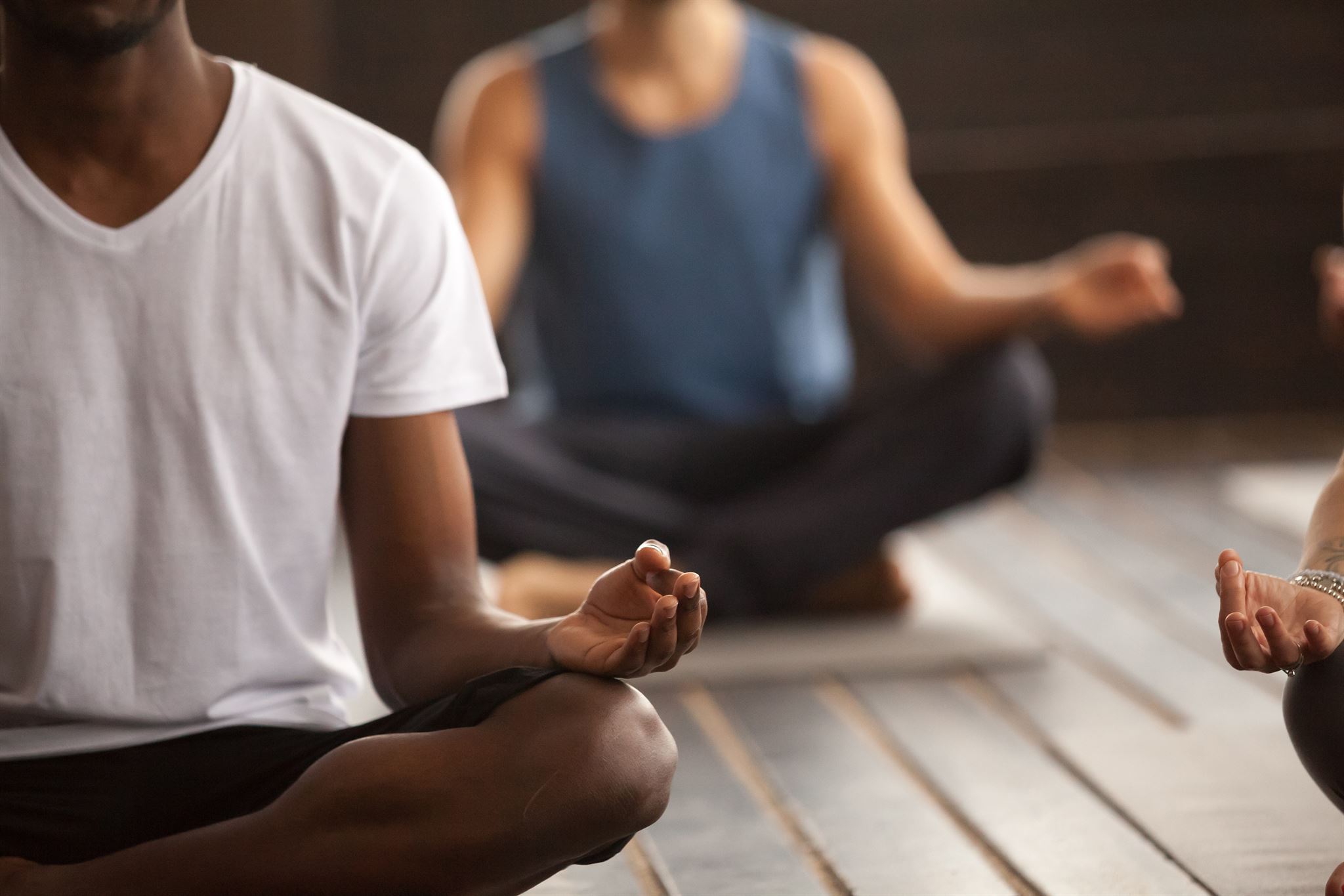 Group meditation session in a bright room
