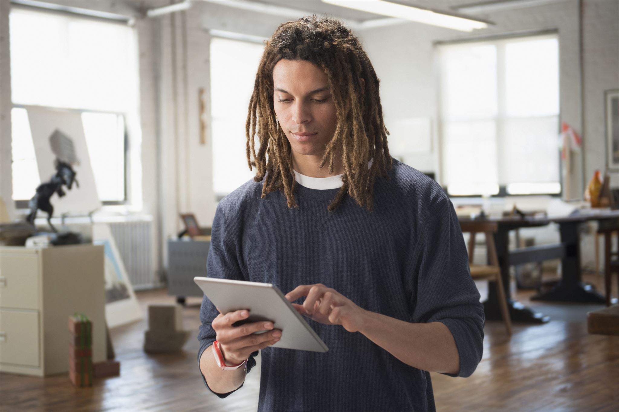 Person using tablet for setup