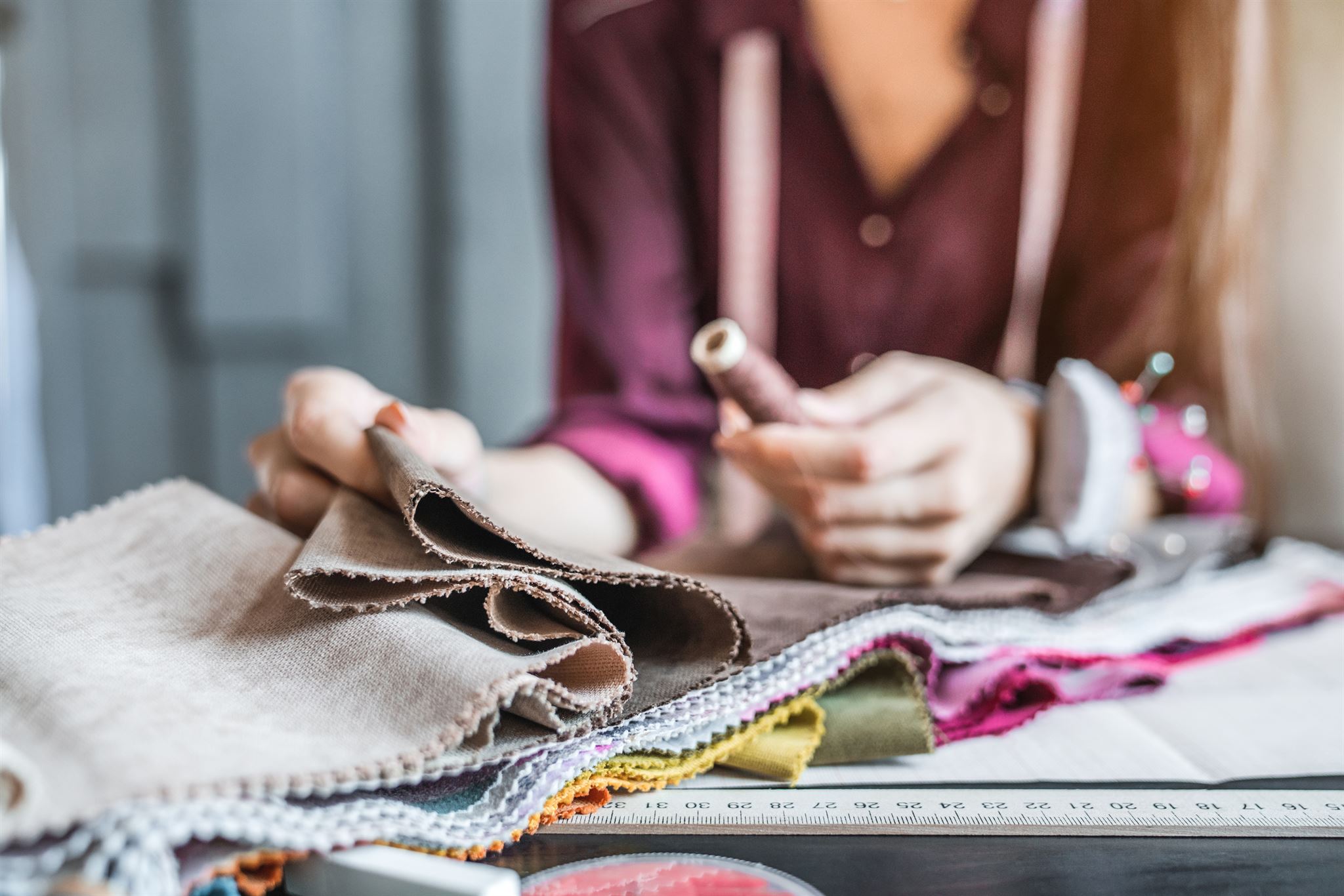 Garment buyer reviewing fabric samples