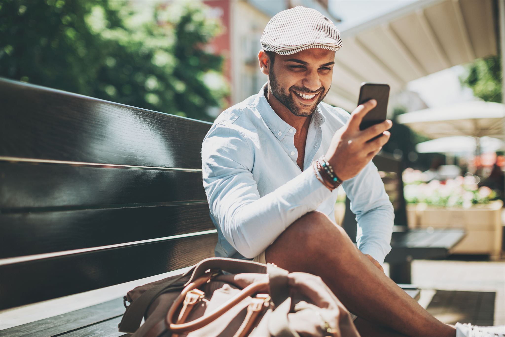 Happy user checking email on smartphone