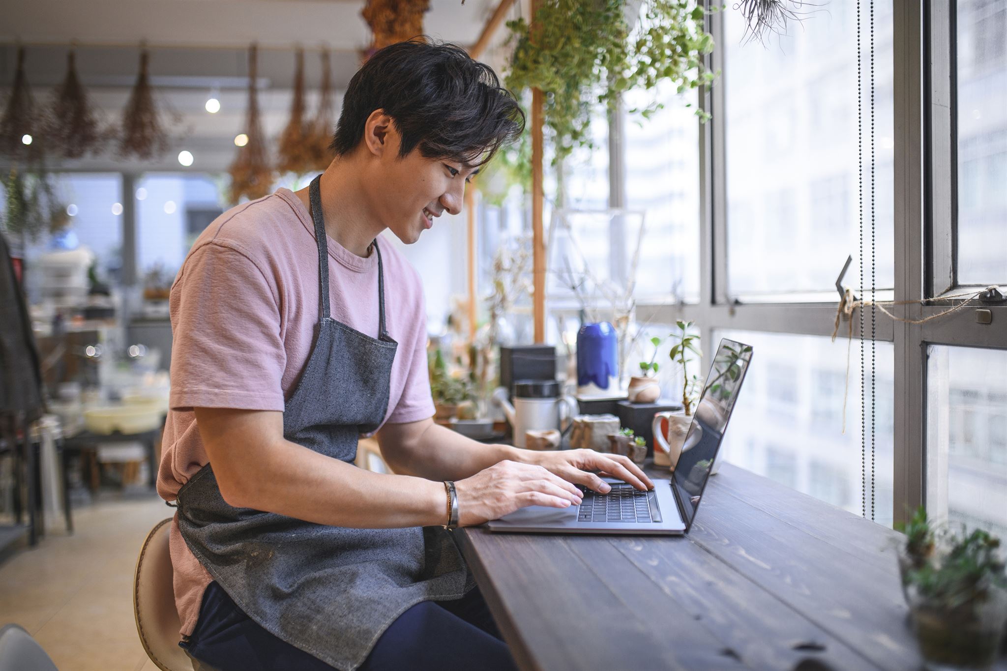 Vendor submitting shipping request form on laptop