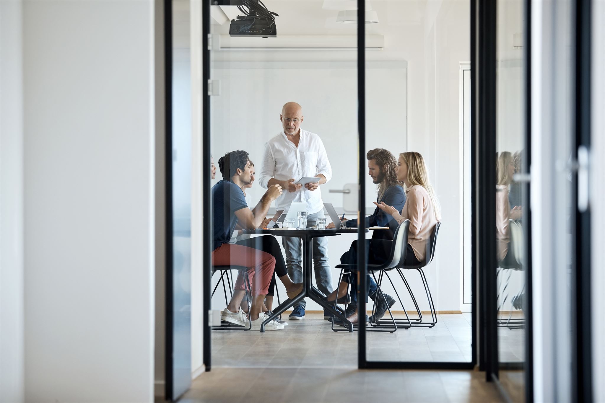 Sales team meeting in modern office