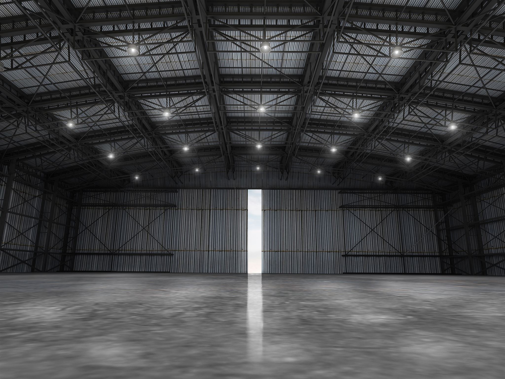 Modern industrial factory interior with machinery and workers