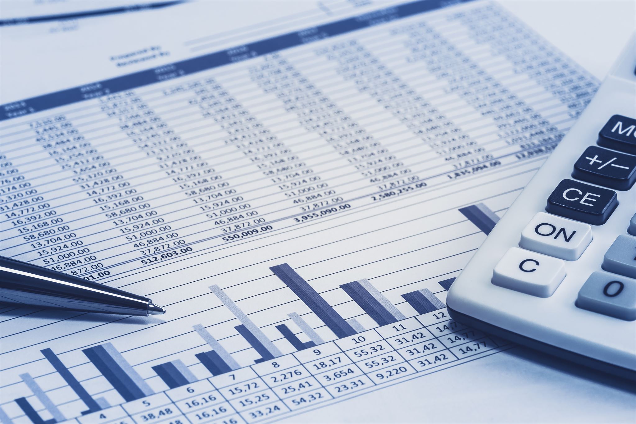 financial documents and calculator on desk